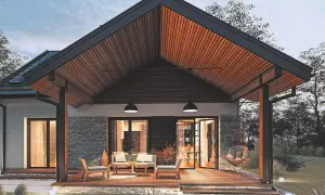 Nowoczesny dom z tarasem, gdzie drewniane belki dachu tworzą przytulną przestrzeń. Wygodne meble wypoczynkowe zapraszają do relaksu.