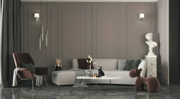 Nowoczesny salon z sofą, fotelem i stolikiem kawowym. Mieszanka stylów: klasyczne panele ścienne, nowoczesne oświetlenie i designerskie meble.