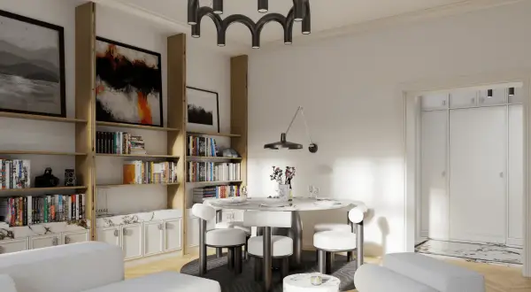Nowoczesne wnetrza domu: białe sofy, okrągły stół z krzesłami, regały z książkami i sztuką, designerska lampa.