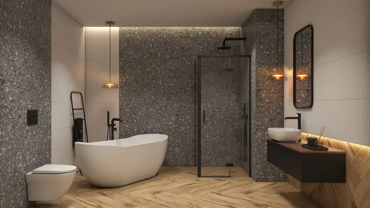 Nowoczesna łazienka 5m2 z wanną i prysznicem. Drewniana podłoga, kamienne płytki i eleganckie oświetlenie tworzą przytulną atmosferę.