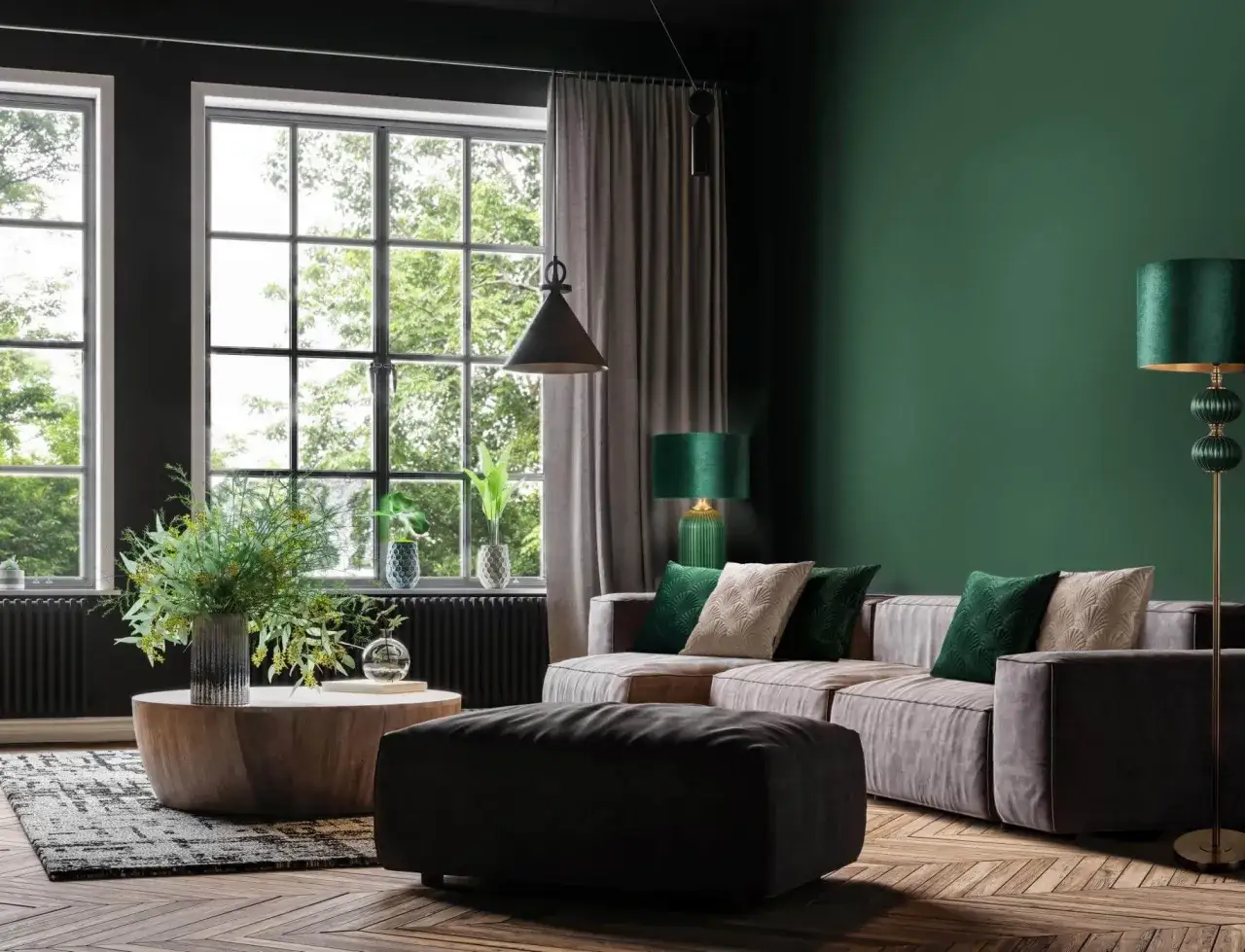 Męski pokój inspiracje: elegancka szara sofa, ciemnozielone ściany, drewniany stolik i stylowe lampy tworzą przytulną atmosferę.