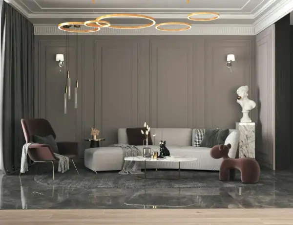 Nowoczesny salon z sofą, fotelem i stolikiem kawowym. Mieszanka stylów: klasyczne panele ścienne, nowoczesne oświetlenie i designerskie meble.